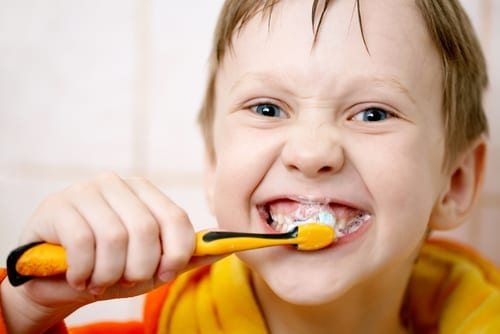 boy brushing teeth